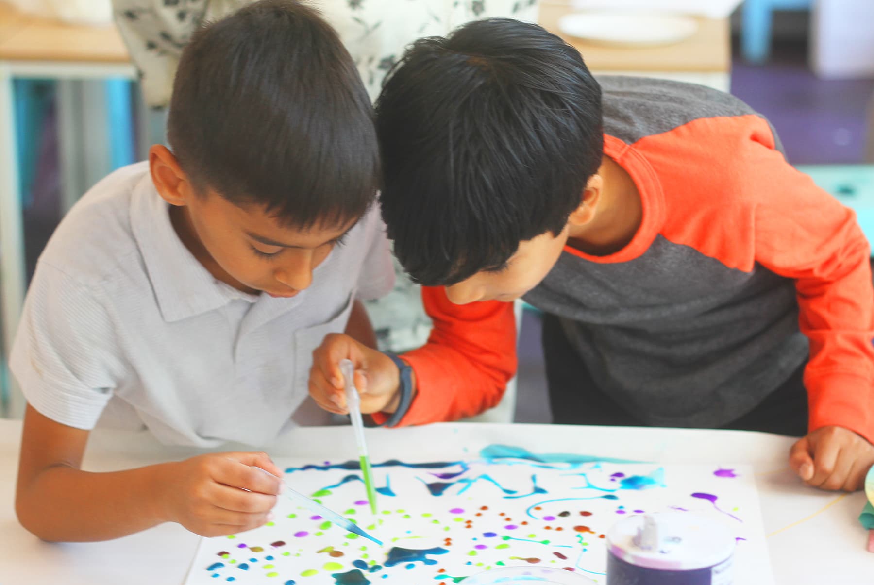 Kids doing art at Playday