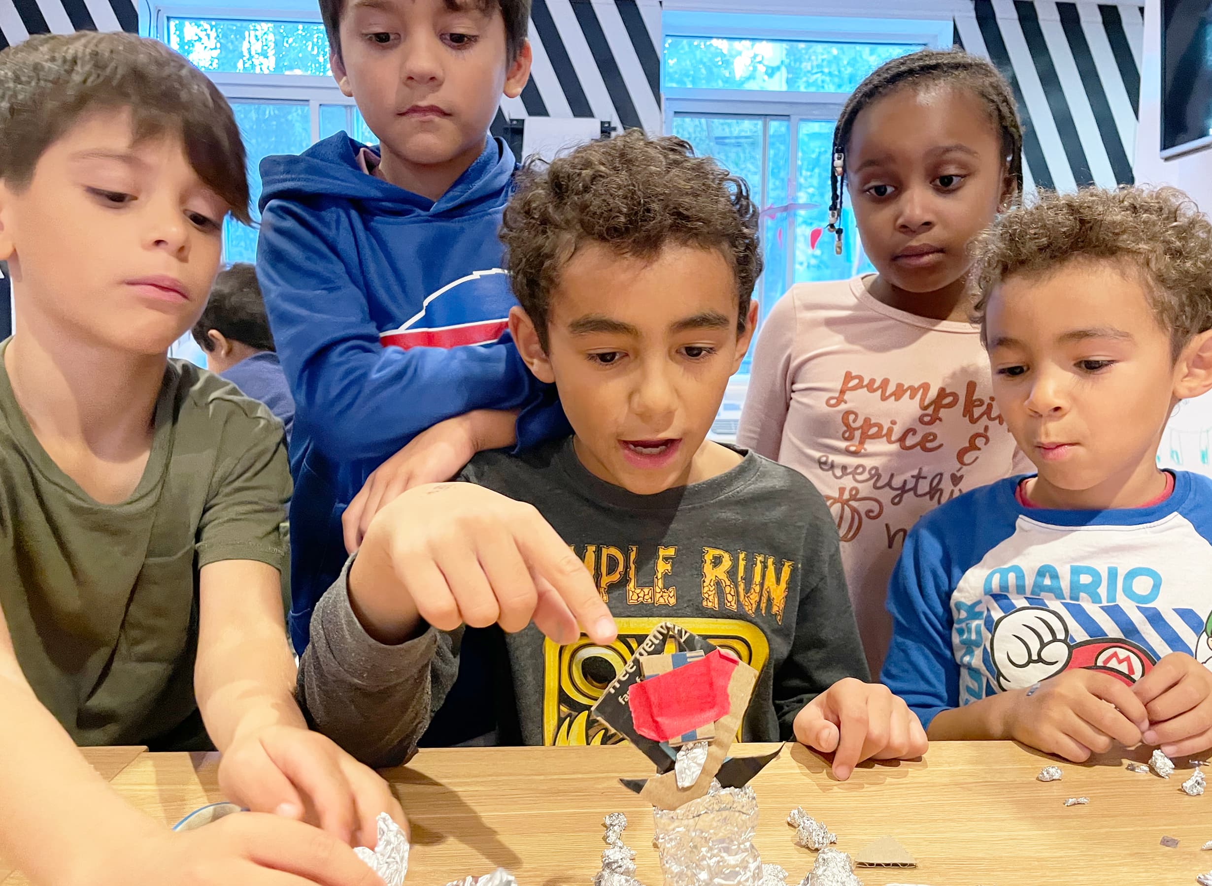 Kids doing sculpture at Playday after school